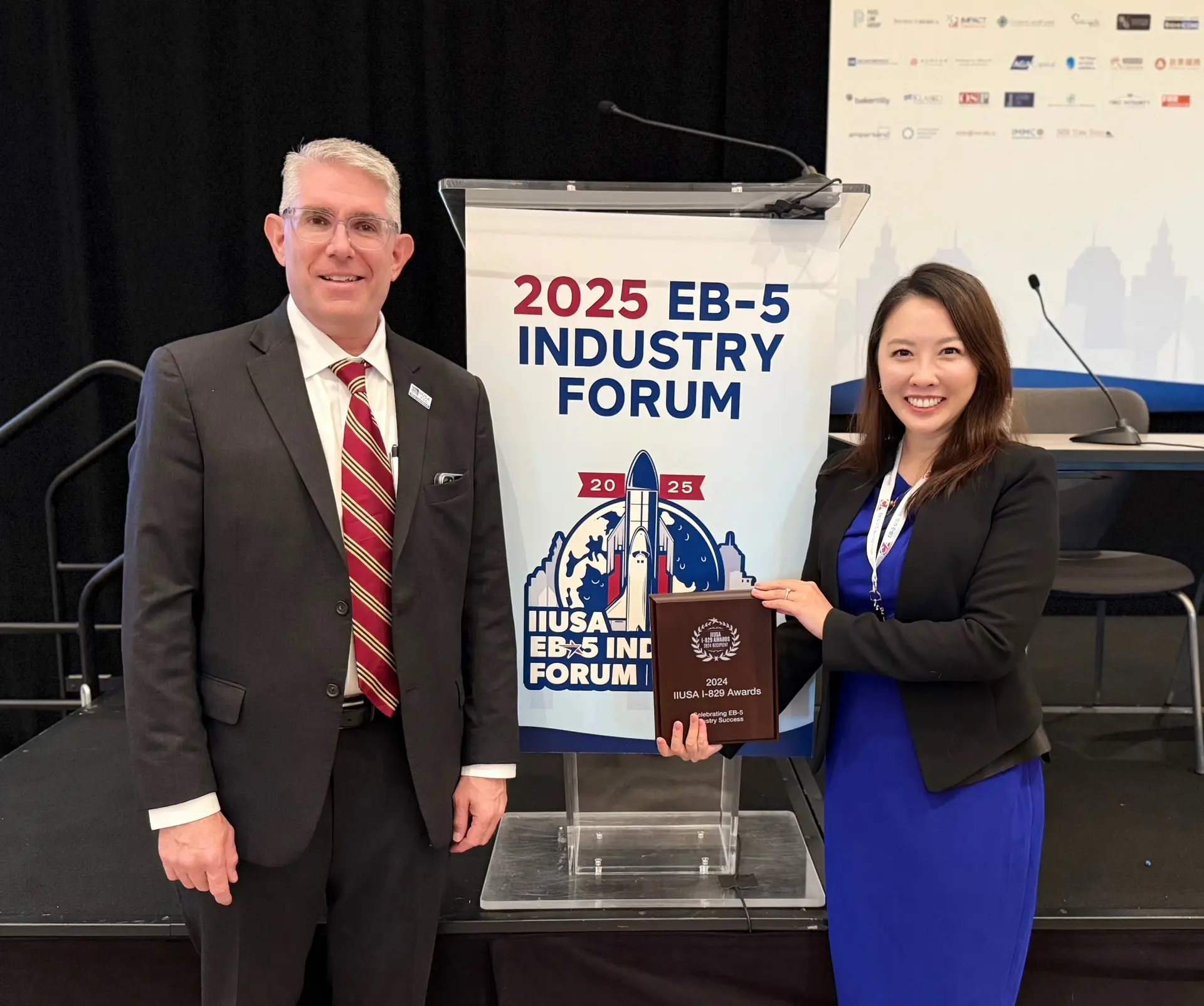 Annie Zhou with IIUSA Executive Director Aaron Grau at EB-5 Industry Forum 2025