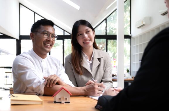 Couple looking at home designs