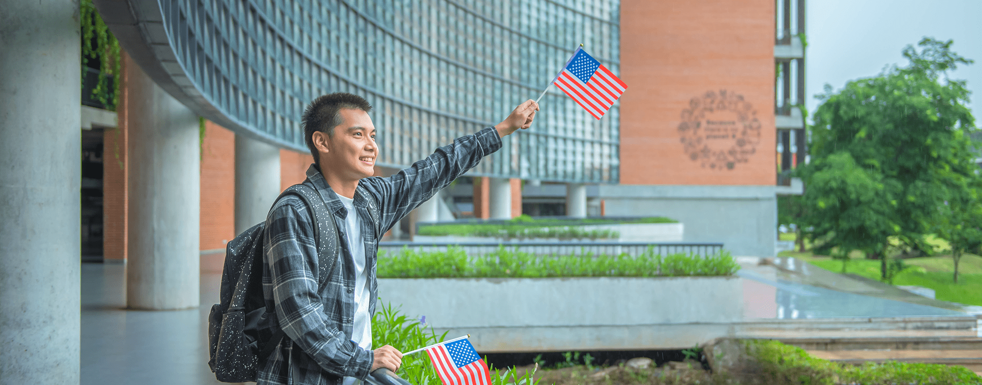Student waiving the American Flag